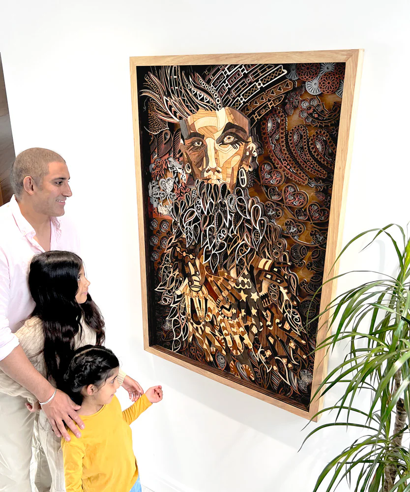 Maj with his daughters Mia and Anna beside the Anthousai Nymph artwork